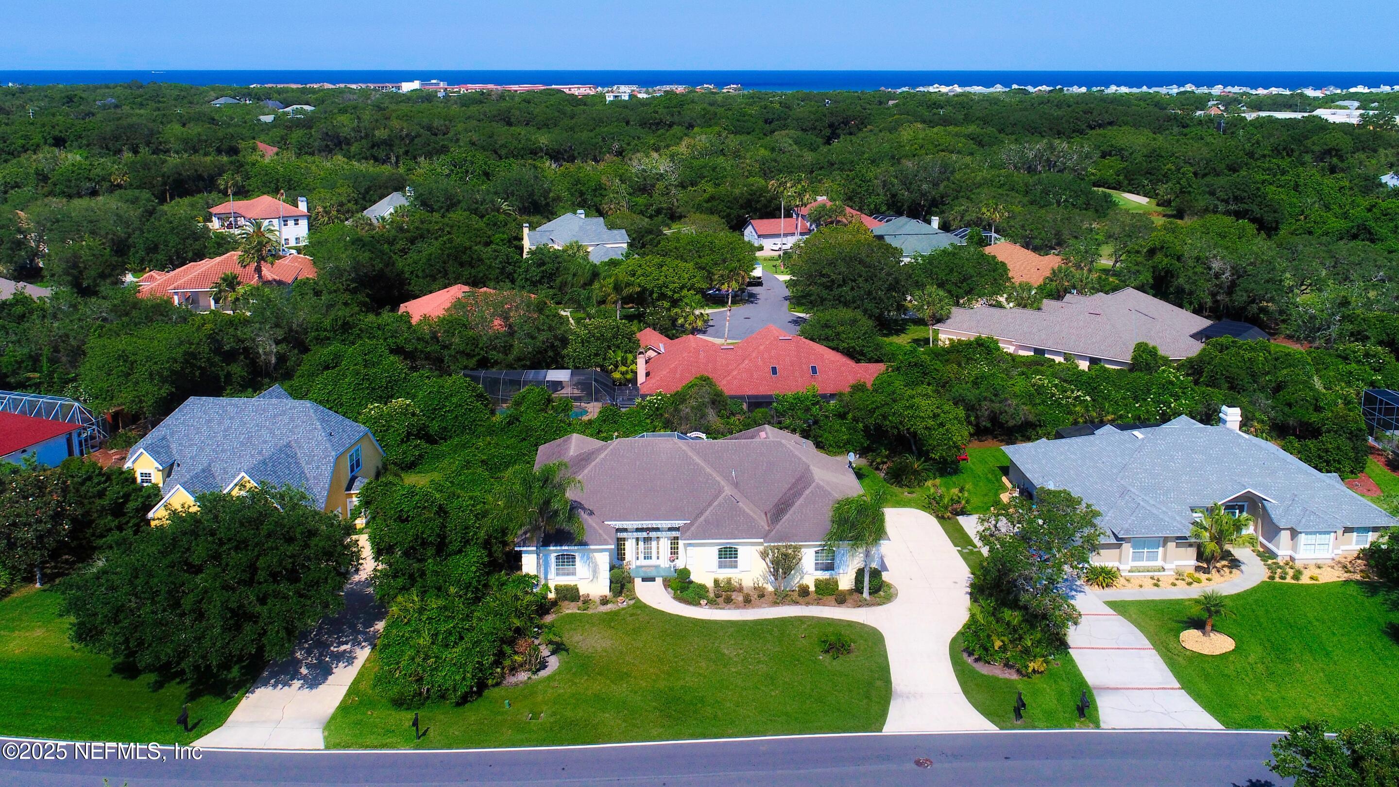430 Marsh Point Circle St. Augustine, FL 32080 - Photo 59 of 69 an aerial view of lake residential houses with outdoor space and trees
