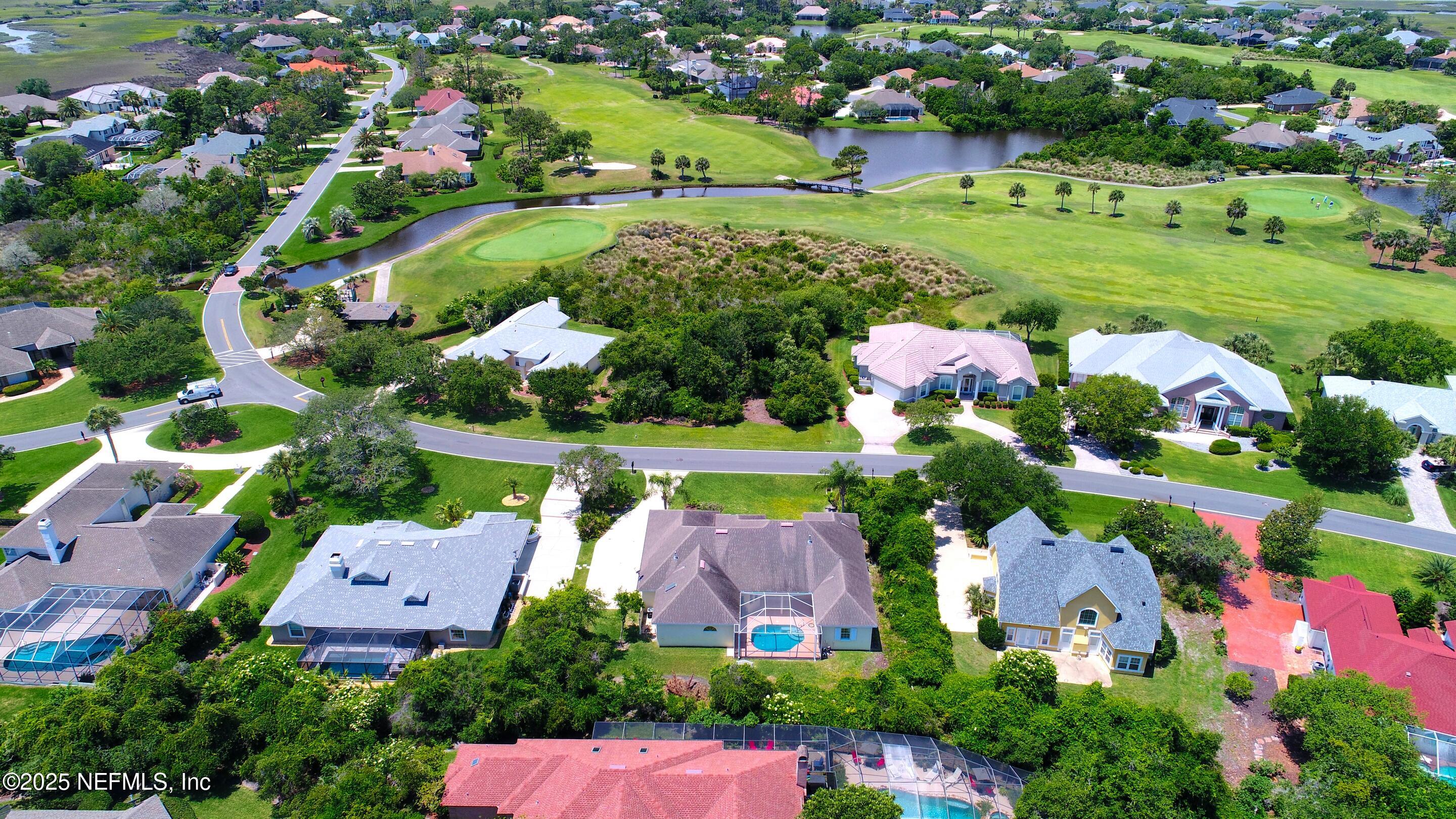 430 Marsh Point Circle St. Augustine, FL 32080 - Photo 65 of 69 an aerial view of a house with a garden