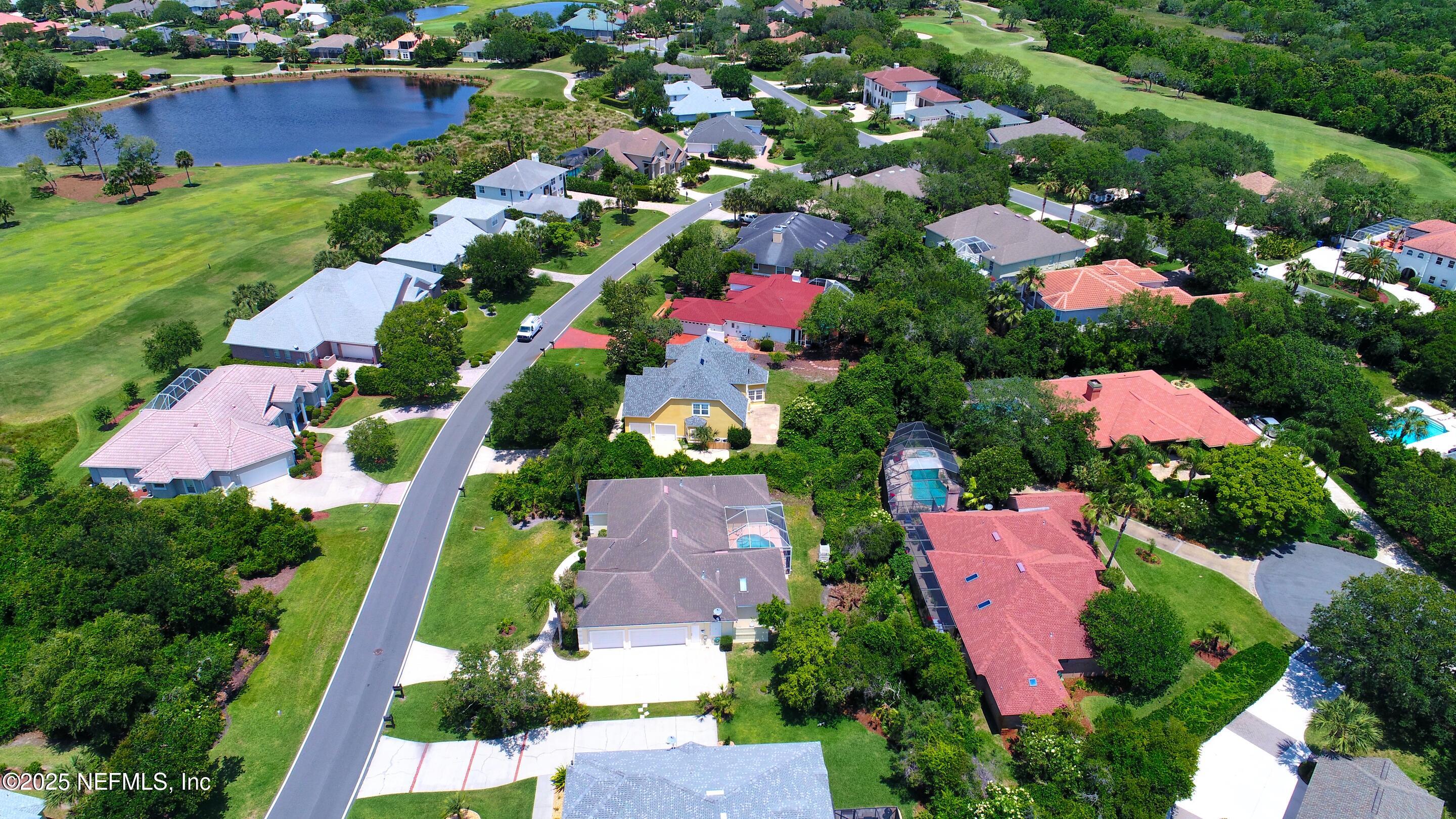 430 Marsh Point Circle St. Augustine, FL 32080 - Photo 68 of 69 an aerial view of house with yard and outdoor seating
