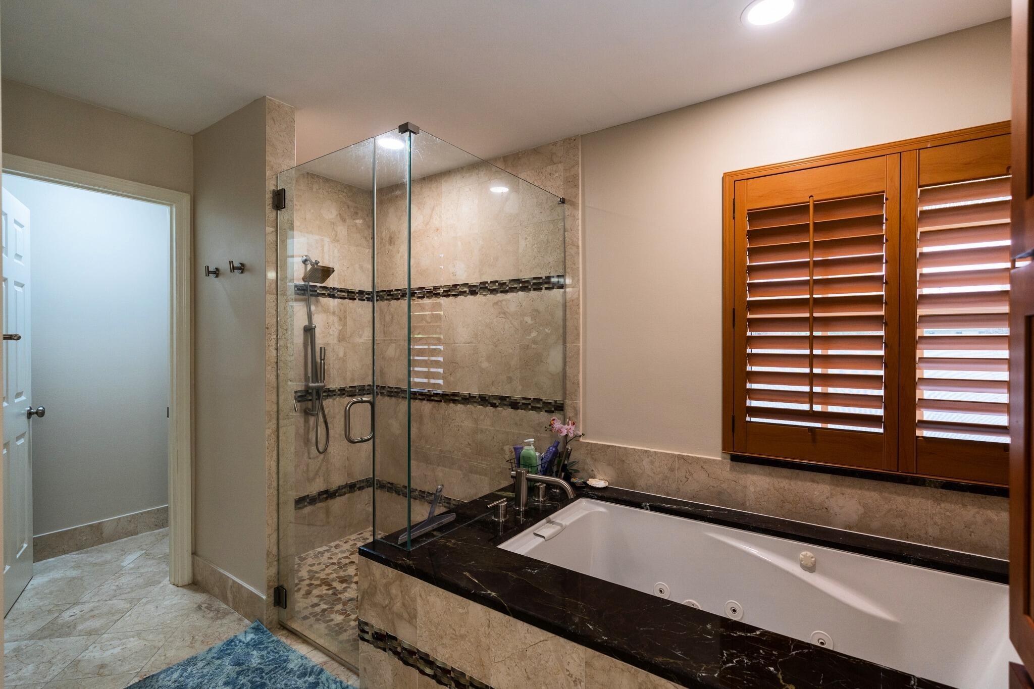 22392 Siesta Key Drive Boca Raton, FL 33428 - Photo 20 of 39 a bathroom with a granite countertop sink and a mirror