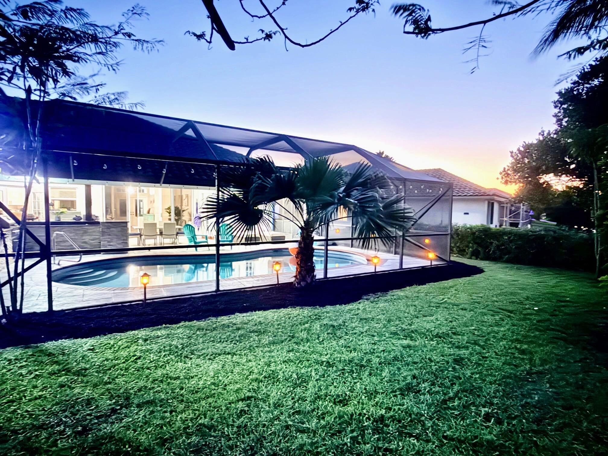 22392 Siesta Key Drive Boca Raton, FL 33428 - Photo 35 of 39 a view of yard with deck and garden