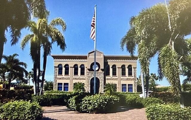 22392 Siesta Key Drive Boca Raton, FL 33428 - Photo 38 of 39 a front view of a house with a garden
