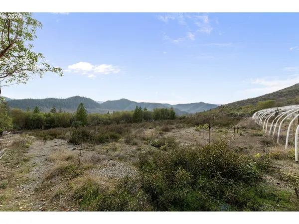 a view of lake with mountain