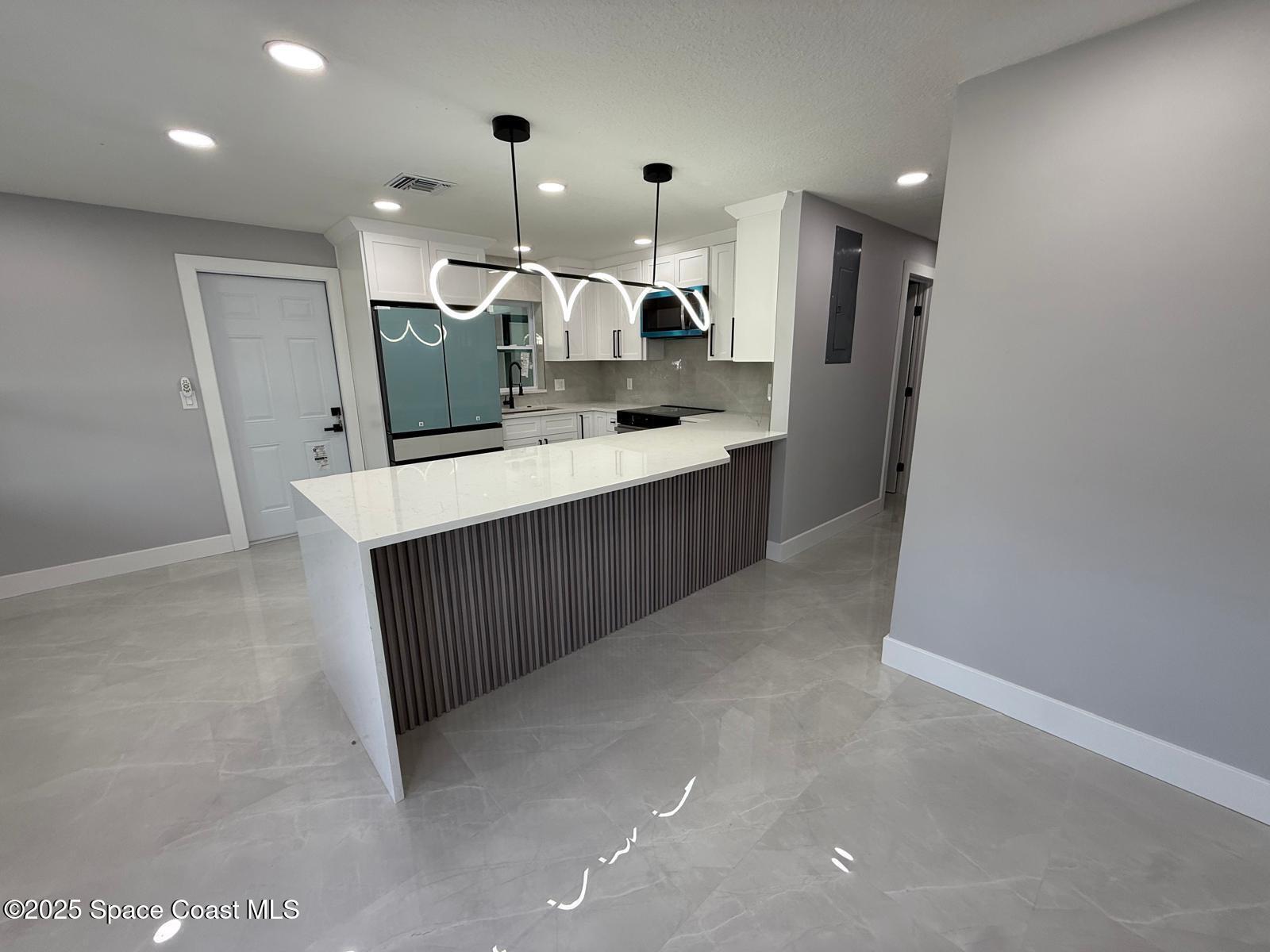 2374 Post Road Melbourne, FL 32935 - Photo 9 of 23 PHOTO-2025-07-08-08-27-49-13