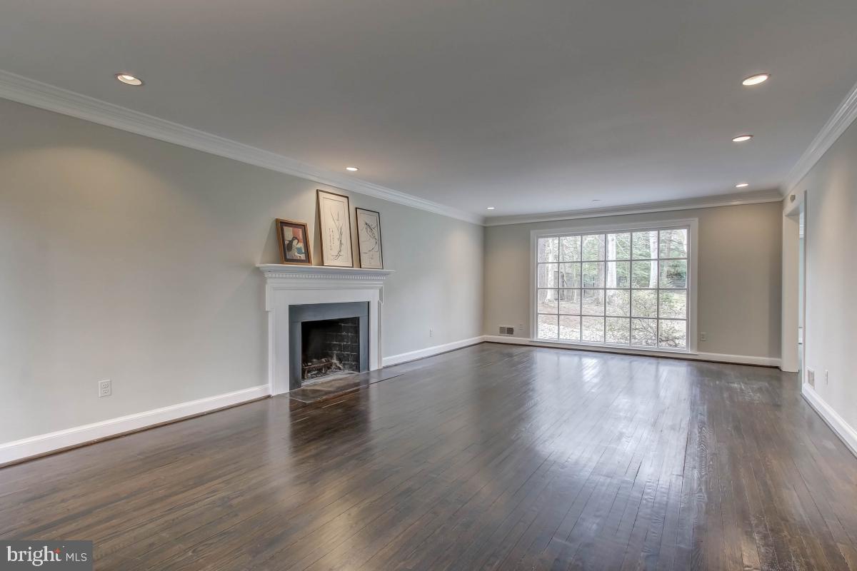 7011 Darby Road Bethesda, MD 20817 - Photo 3 of 37 large living room with fireplace