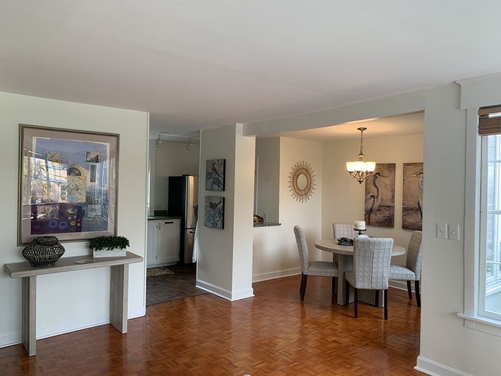 62 Pleasant Street Newton, MA 02459 - Photo 8 of 17 a view of a kitchen and dining room