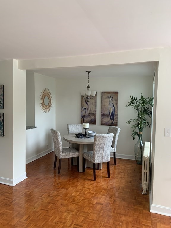 62 Pleasant Street Newton, MA 02459 - Photo 9 of 17 a view of a dining room with furniture
