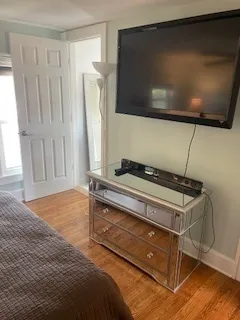 a view of a livingroom with furniture and window