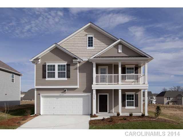 79369 Ridgehaven Road, Unit 26 Lancaster, SC 29720 - Photo 1 of 16 a front view of a house with a yard