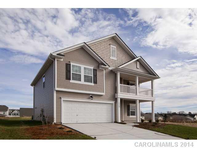 79369 Ridgehaven Road, Unit 26 Lancaster, SC 29720 - Photo 2 of 16 a front view of a house with a yard