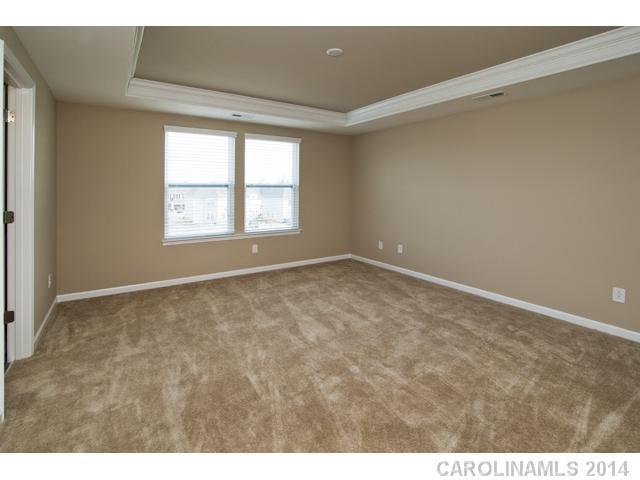 79369 Ridgehaven Road, Unit 26 Lancaster, SC 29720 - Photo 10 of 16 a view of an empty room with a window