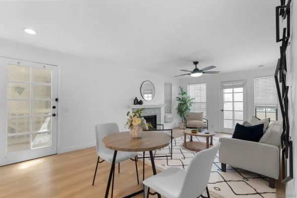a view of a livingroom with furniture and wooden floor