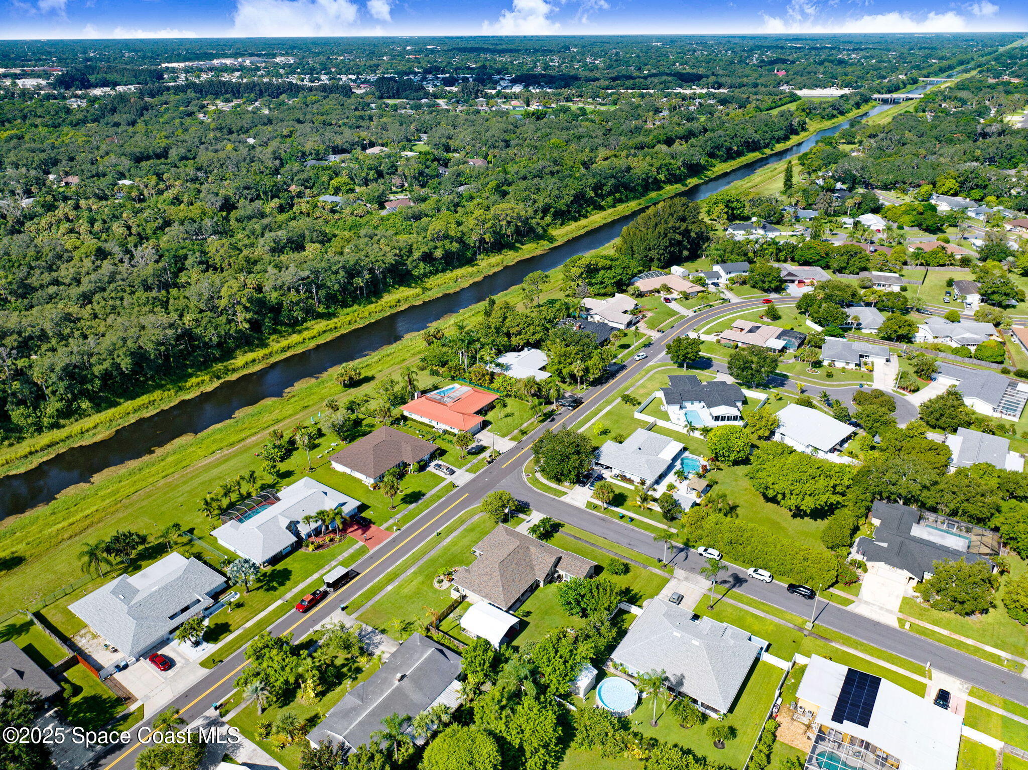 1507 Meadowbrook Road Northeast Palm Bay, FL 32905 - Photo 45 of 50 an aerial view of a city