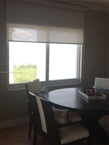 a vase of flowers sitting on a table