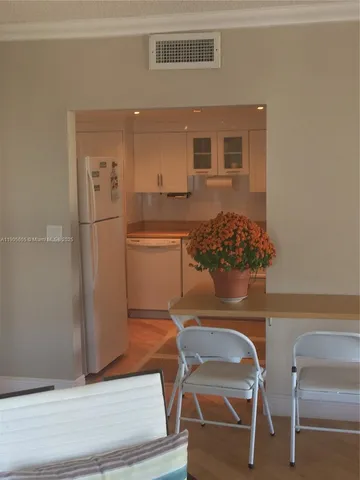 a workspace with furniture and window