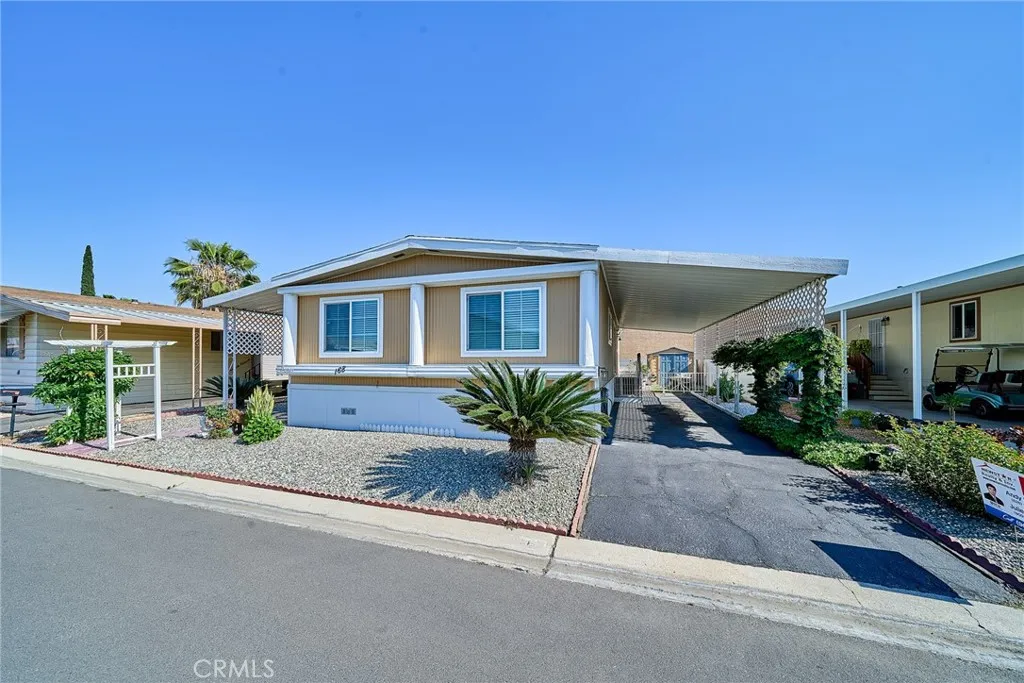 4000 Pierce Street, Unit 168 Riverside, CA 92505 - Photo 1 of 34 front view of a house with a street