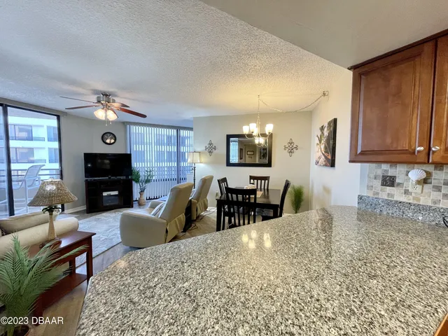 a bedroom with a bed dresser and a window