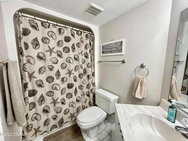 a view of storage and utility room with washer and dryer