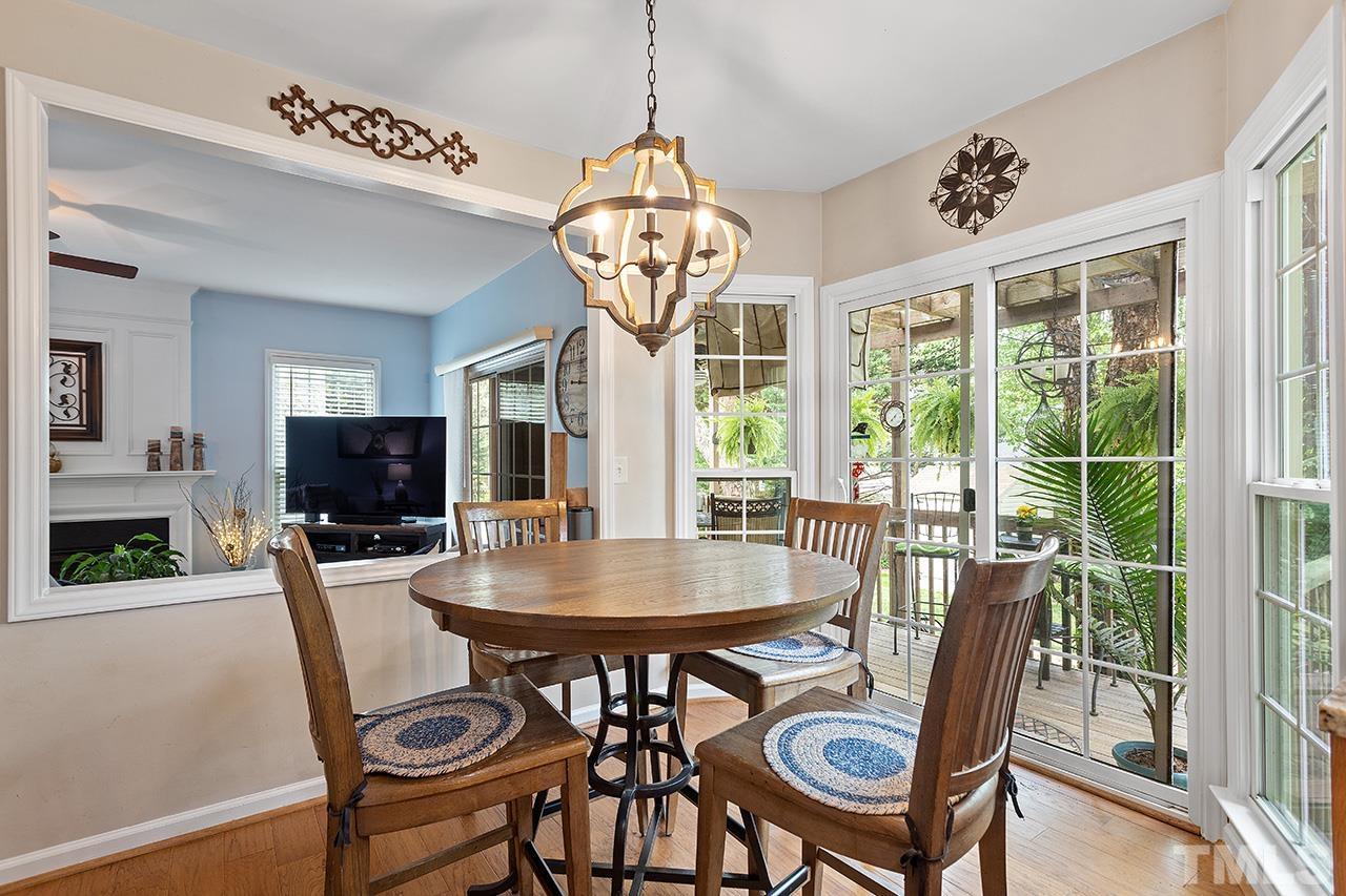 9529 Miranda Drive Raleigh, NC 27617 - Photo 11 of 39 This sunny breakfast area sits conveniently between the kitchen and family room and leads to the double sliding door and the large deck beyond