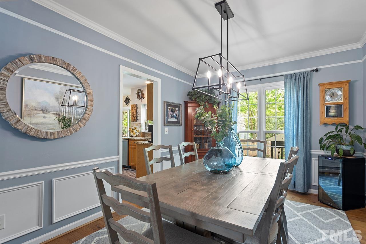 9529 Miranda Drive Raleigh, NC 27617 - Photo 6 of 39 Updated fixtures blend beautifully with traditional millwork in the formal dining room