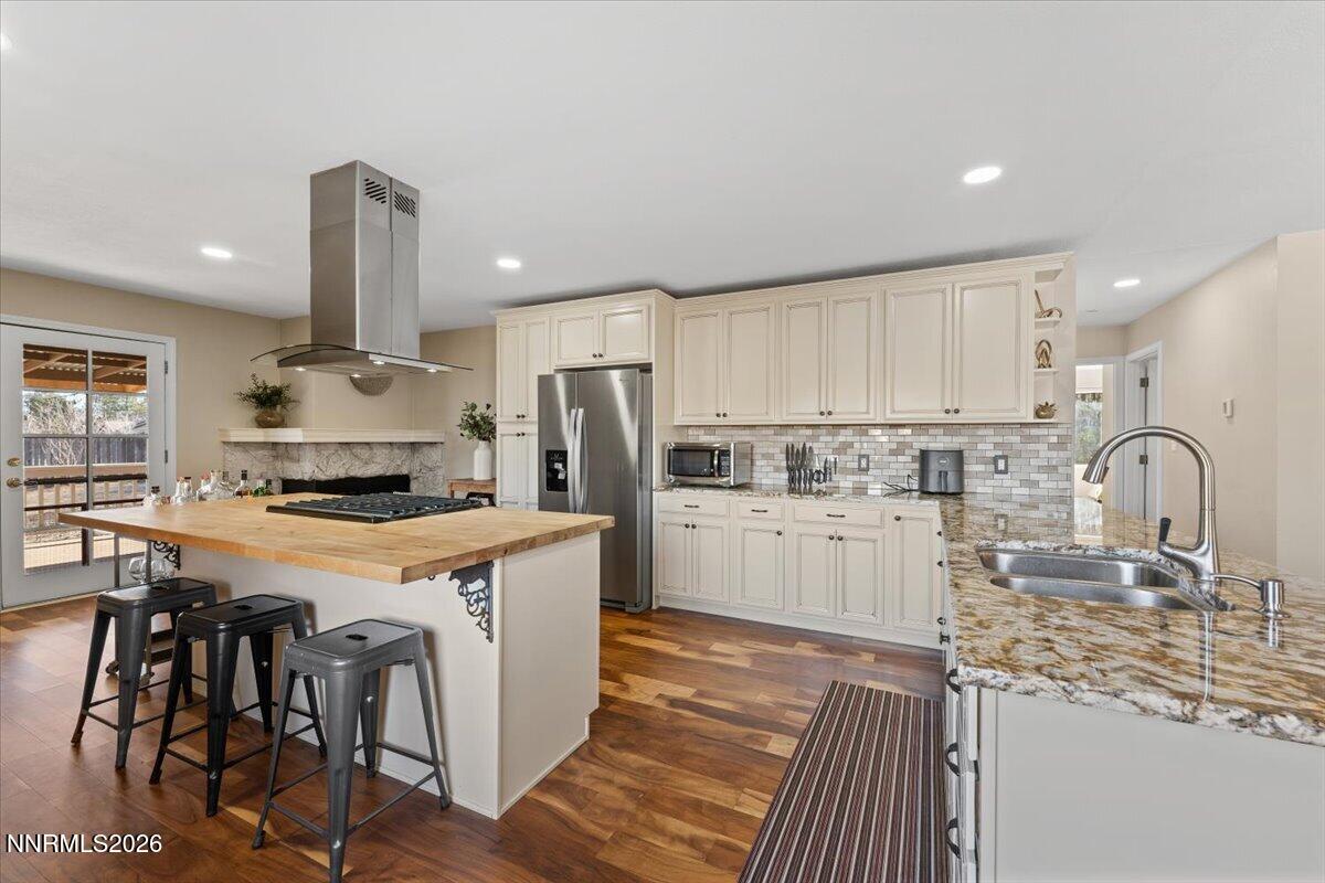 2224 Escalera Way Reno, NV 89523 - Photo 16 of 44 a kitchen with a stove a sink and a refrigerator