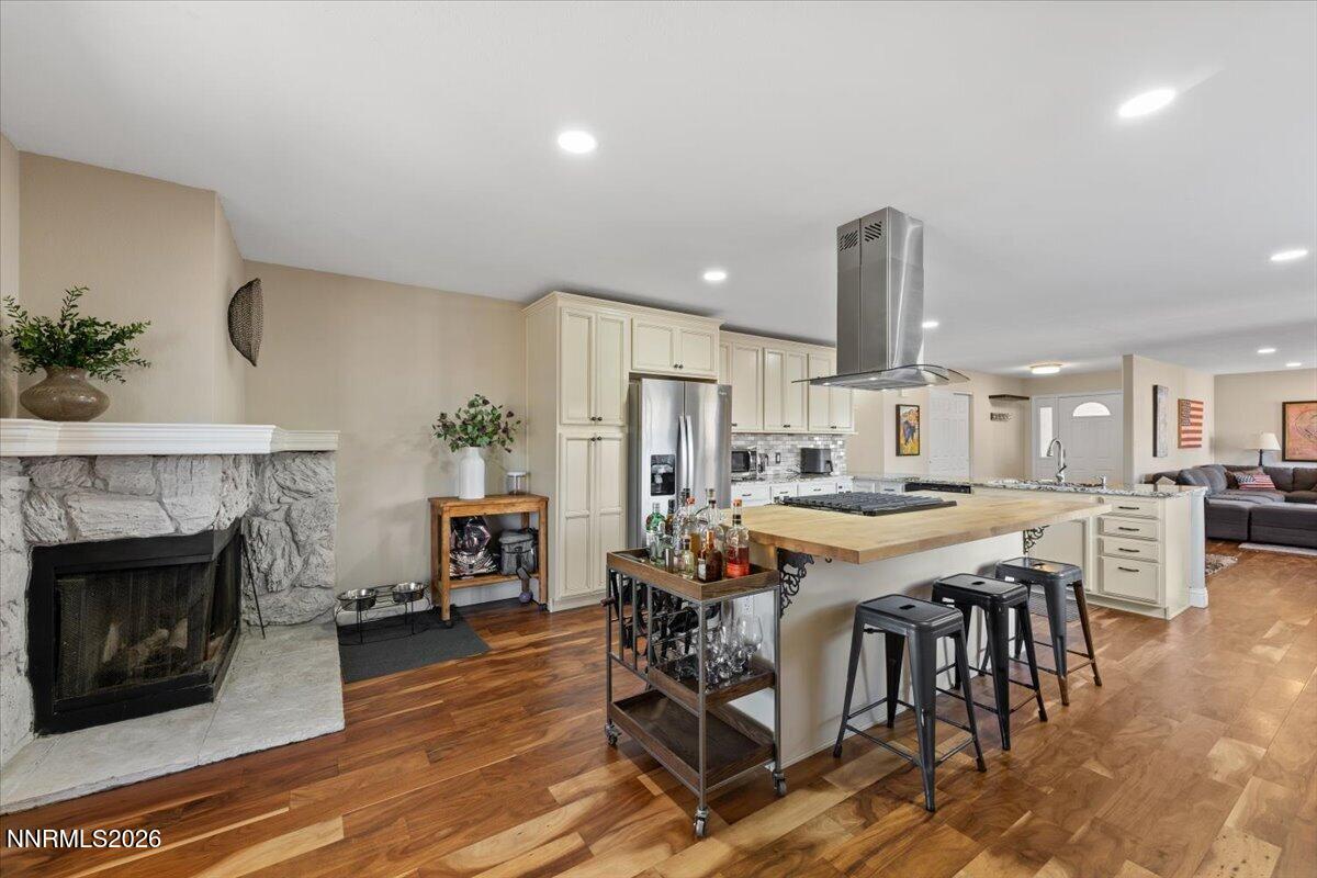 2224 Escalera Way Reno, NV 89523 - Photo 18 of 44 a large kitchen with cabinets table and chairs