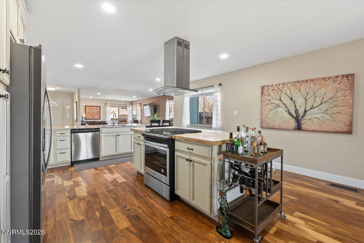 2224 Escalera Way Reno, NV 89523 - Photo 19 of 44 a kitchen with granite countertop a refrigerator stove top oven and sink