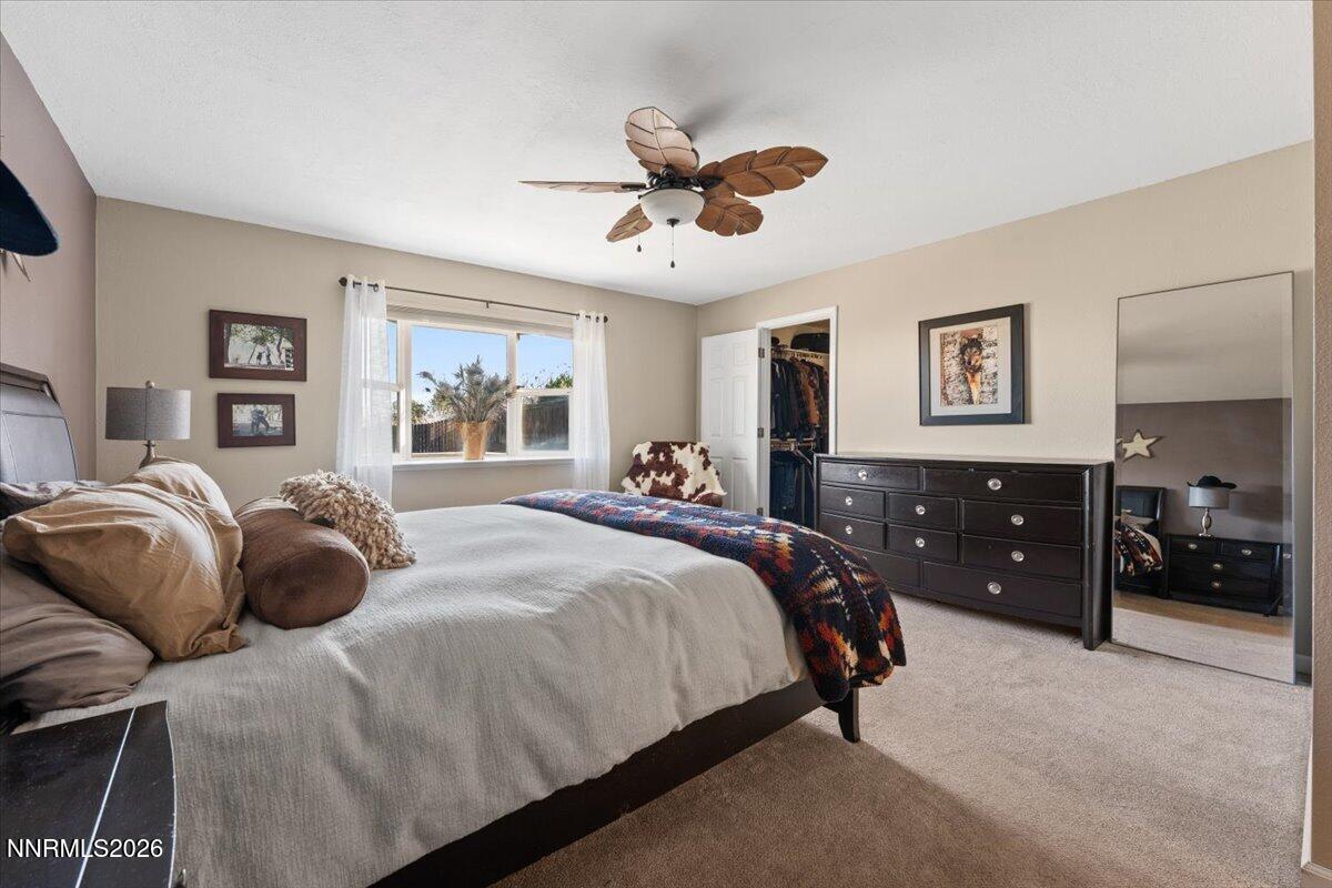 2224 Escalera Way Reno, NV 89523 - Photo 23 of 44 a bedroom with a bed and window