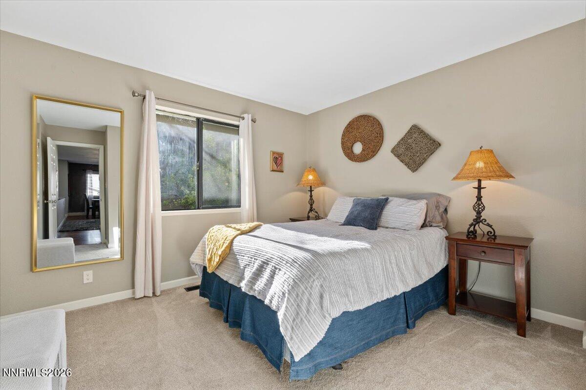 2224 Escalera Way Reno, NV 89523 - Photo 34 of 44 a bedroom with a bed and window