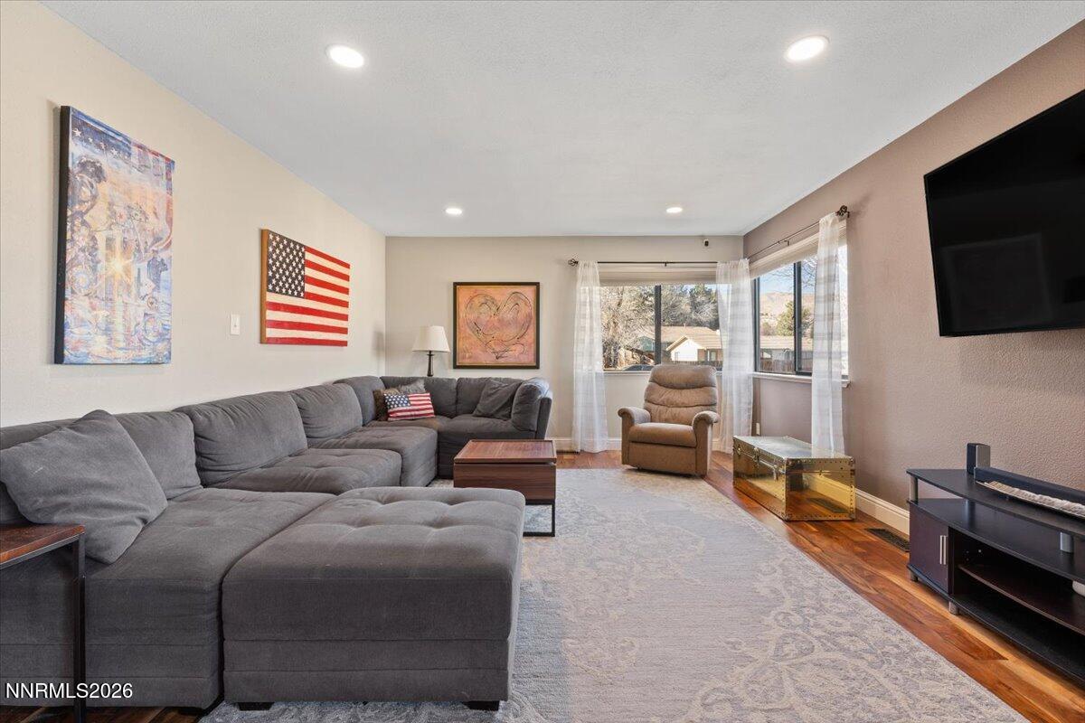 2224 Escalera Way Reno, NV 89523 - Photo 8 of 44 a living room with furniture and a flat screen tv