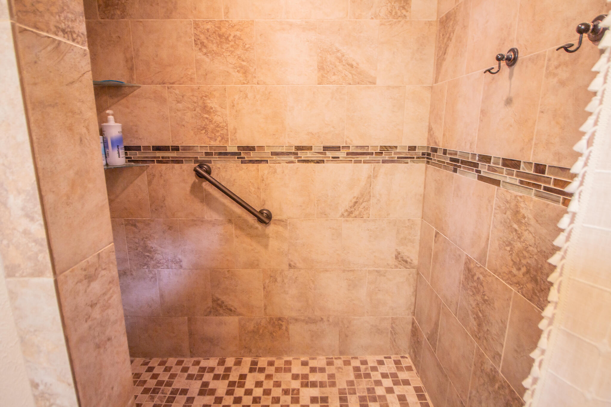 907 Ave H Hale Center, TX 79041 - Photo 25 of 32 a close view of a shower in a bathroom