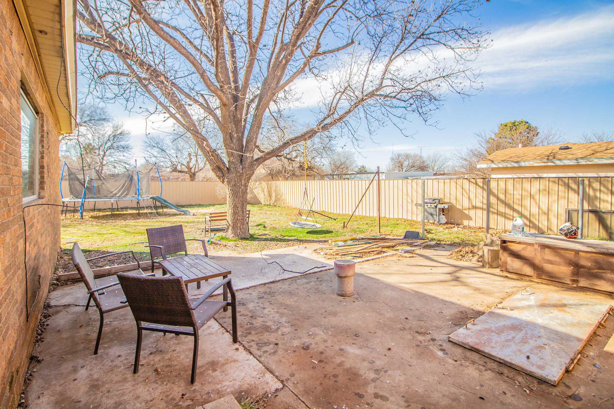 907 Ave H Hale Center, TX 79041 - Photo 28 of 32 a view of a swimming pool with a lounge chairs