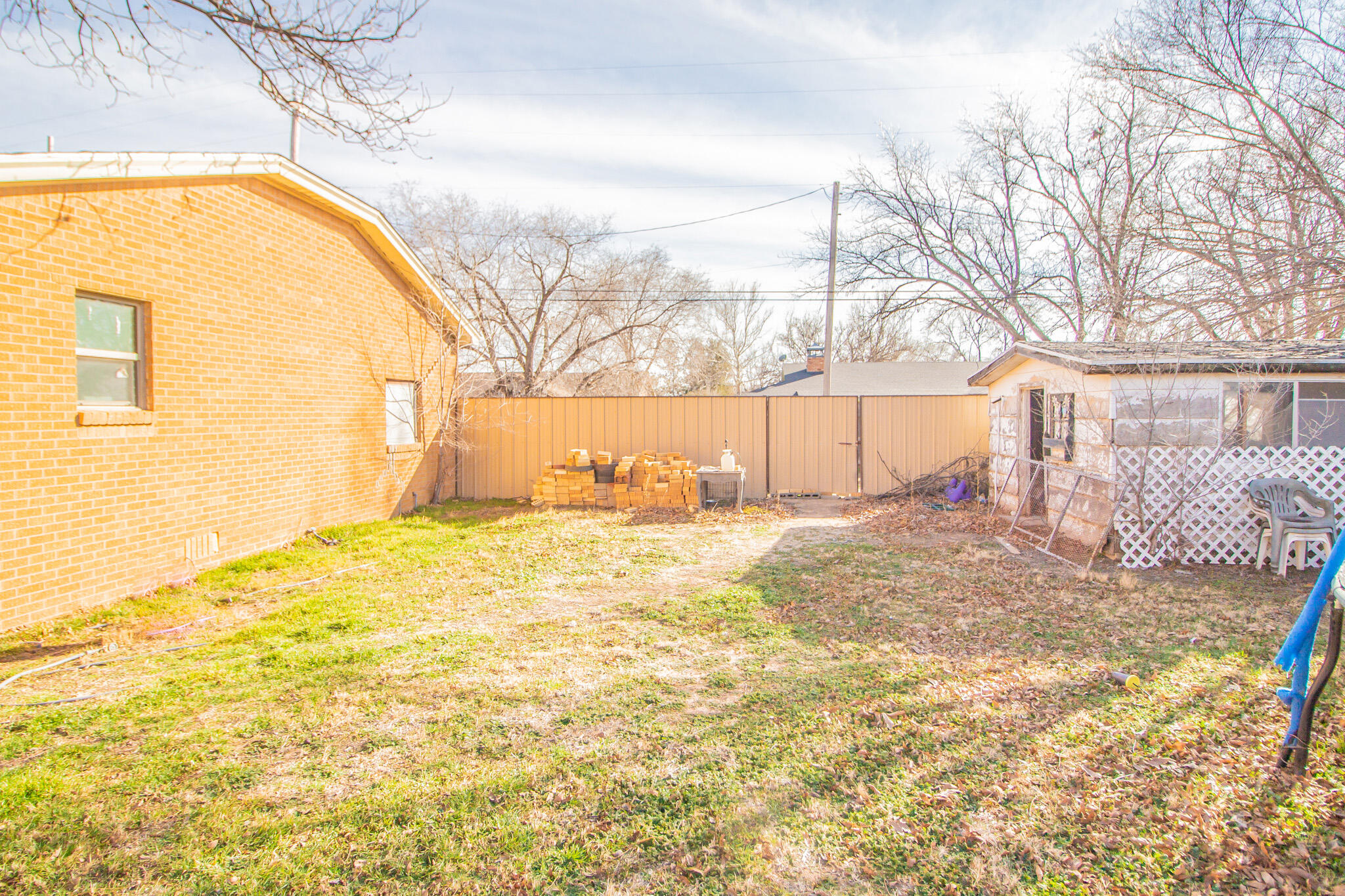 907 Ave H Hale Center, TX 79041 - Photo 31 of 32 a view of back yard of the house