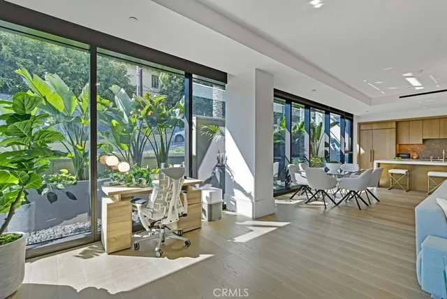 a view of a living room and dining room