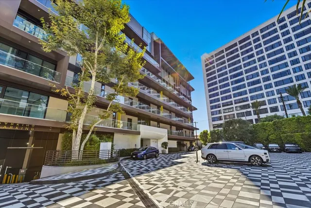 a view of a building with sitting area