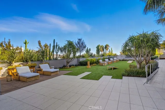 a view of a building with a yard