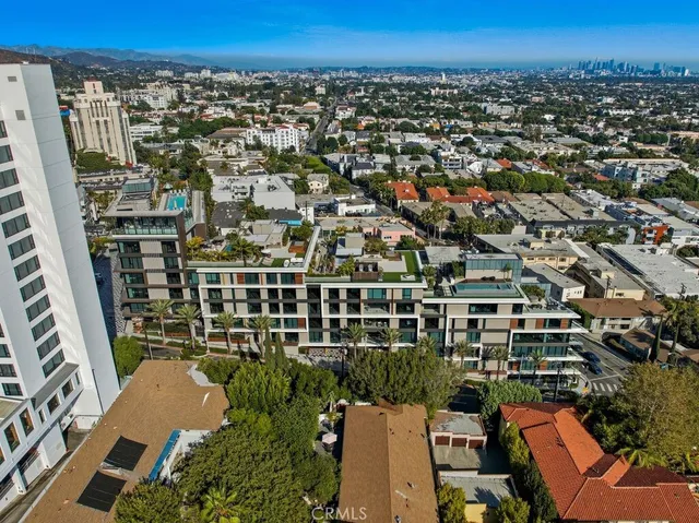 an aerial view of a city with lots of residential buildings