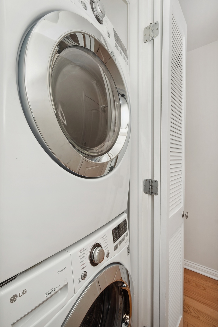 21 West Chestnut Street, Unit 1408 Chicago, IL 60610 - Photo 14 of 17 a close up view of a washer and dryer