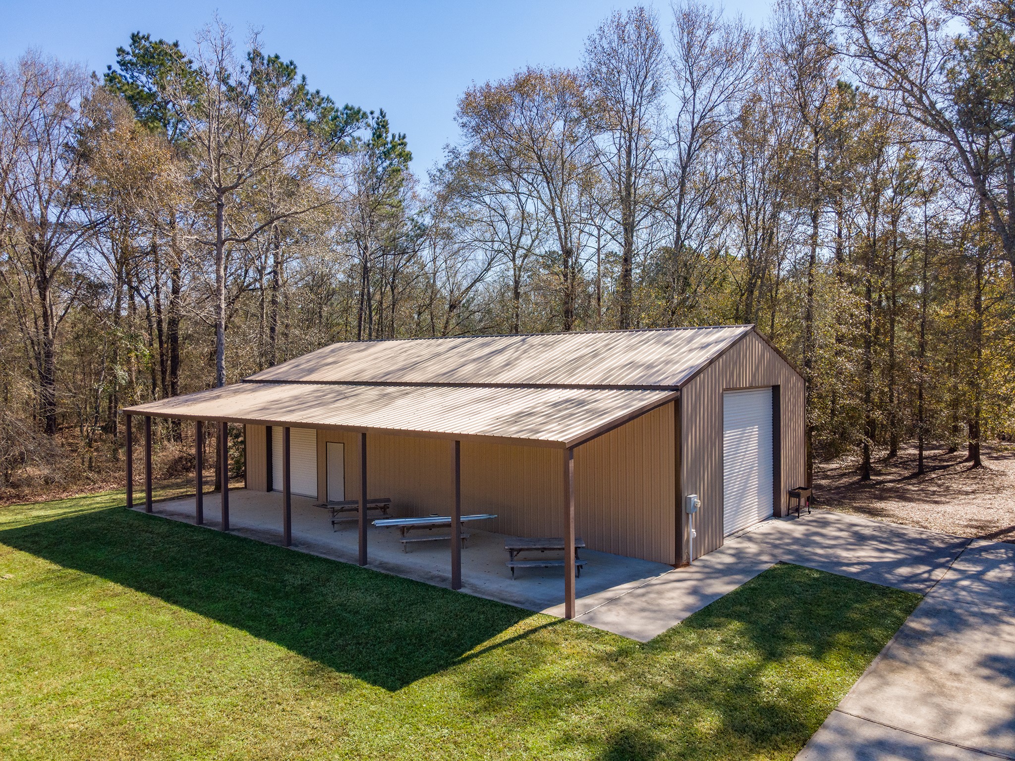 27688 Rio Blanco Drive Splendora, TX 77372 - Photo 4 of 50 a view of a house with backyard and sitting area