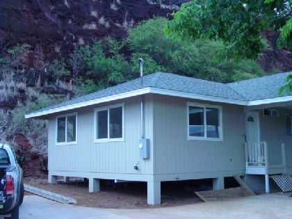 4635 A Menehune Road Waimea, HI 96796 - Photo 3 of 11 a view of a house with a yard and large tree