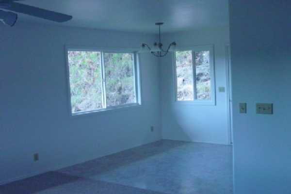 4635 A Menehune Road Waimea, HI 96796 - Photo 6 of 11 an empty room with a window