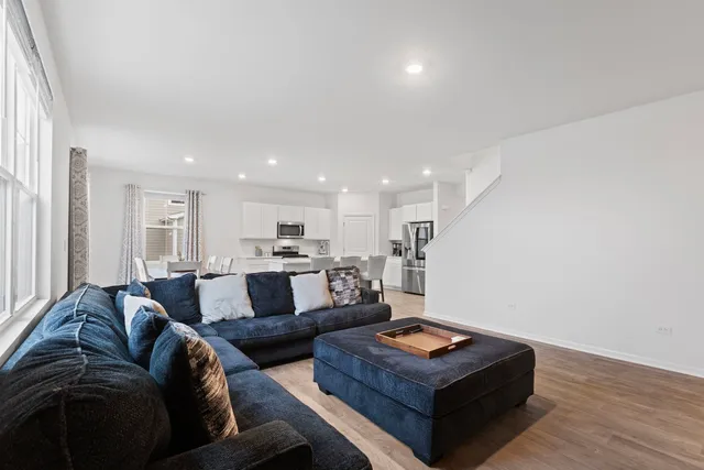 a living room with furniture and a couch