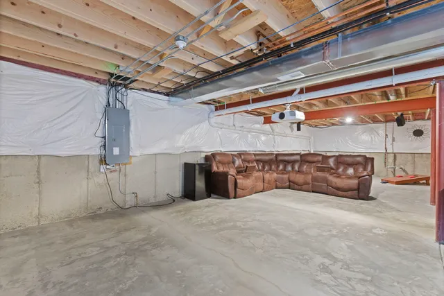 a view of an empty room with storage