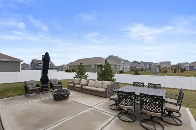 a view of a terrace with sitting area