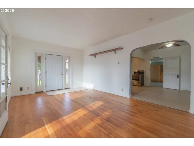 a view of an empty room and window