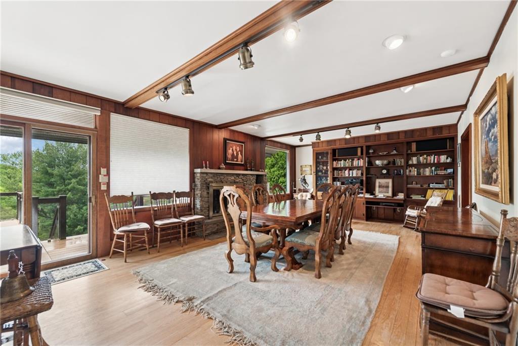 428 Jefferson School Road Ligonier, PA 15658 - Photo 15 of 50 a dining room with furniture water view and a floor to ceiling window