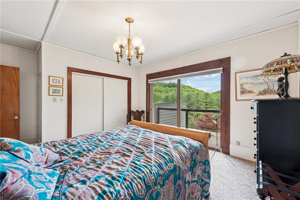 428 Jefferson School Road Ligonier, PA 15658 - Photo 28 of 50 a bedroom with a bed and a window