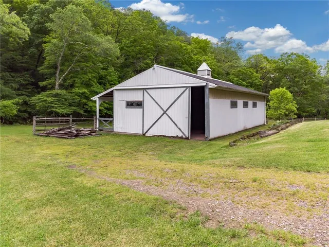 a view of a backyard with a house