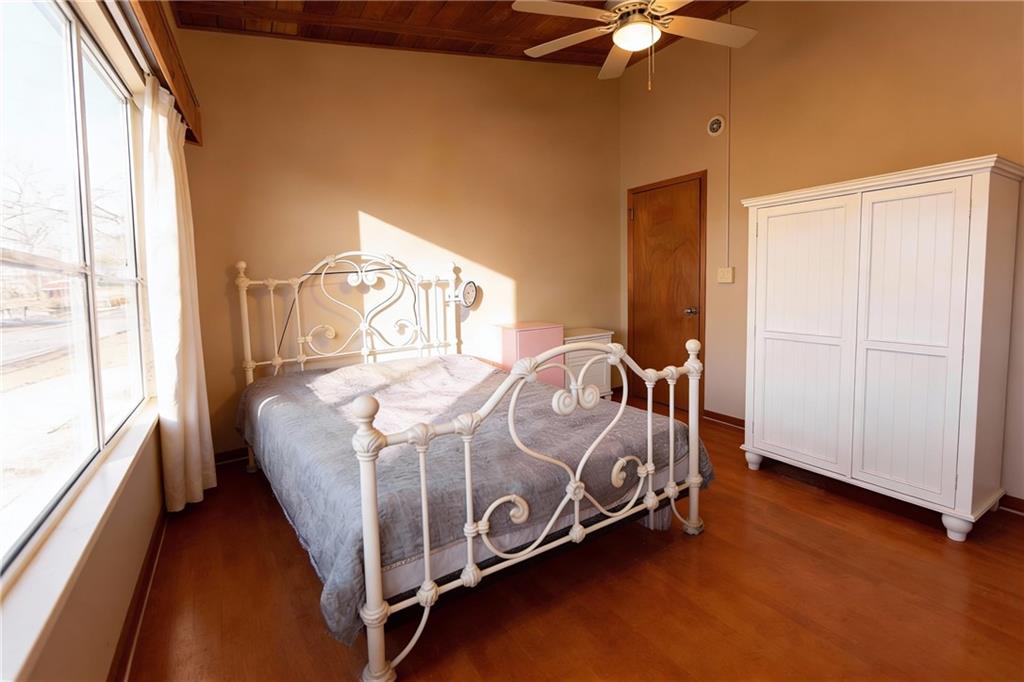 500 Piedmont Road Marietta, GA 30066 - Photo 14 of 40 a bed sitting in a bedroom next to a window