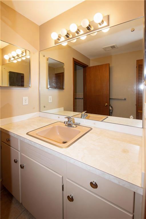 500 Piedmont Road Marietta, GA 30066 - Photo 19 of 40 a bathroom with a sink and a mirror